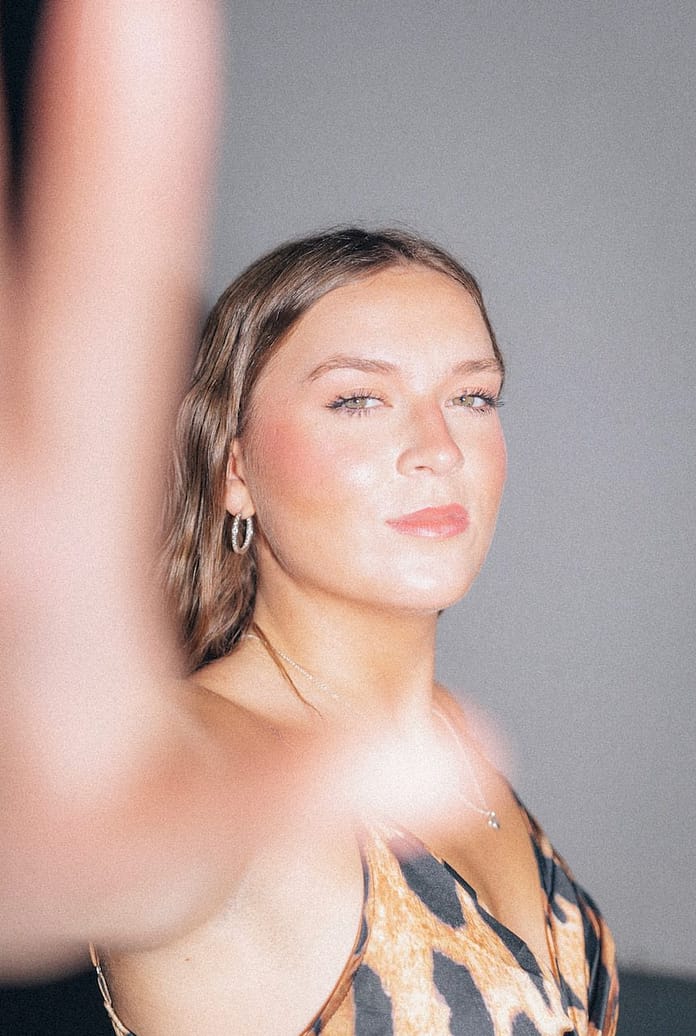 Olivia Booth Ignites The Indie Pop Scene With "Satisfied"