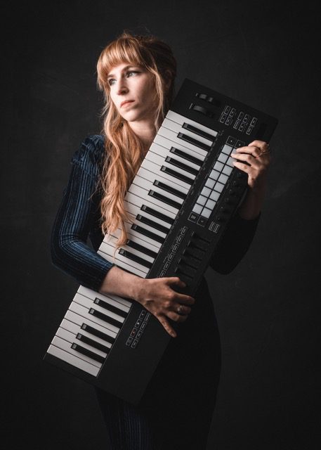 Tess Posner Transforms Pain Into Golden Melodies In 'Alchemy' EP